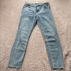 H&M light blue jeans with distressed hem